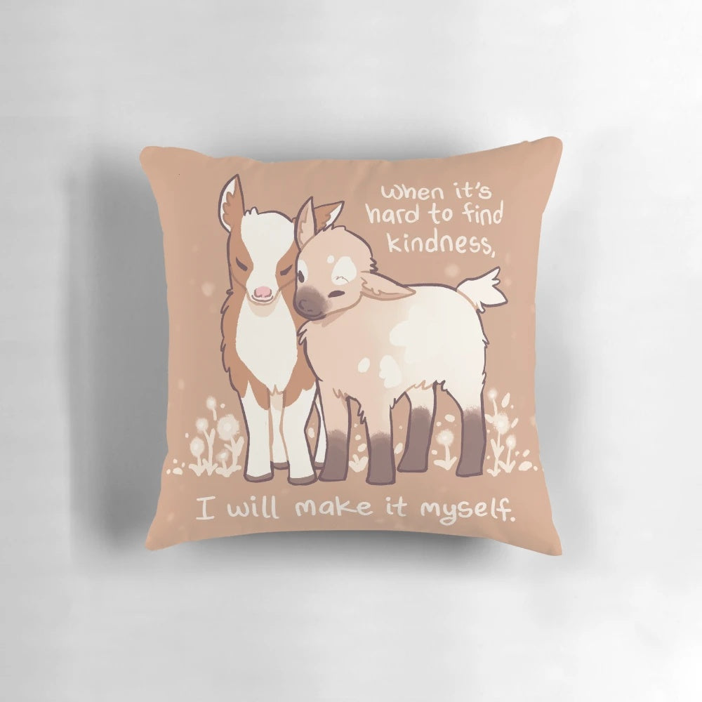 A soft, plush pillow featuring an illustration of adorable baby goats, designed to promote kindness and self-care.