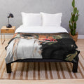 A soft and snuggly plush blanket featuring a mama art design, perfect for movie nights and overcoming fears.