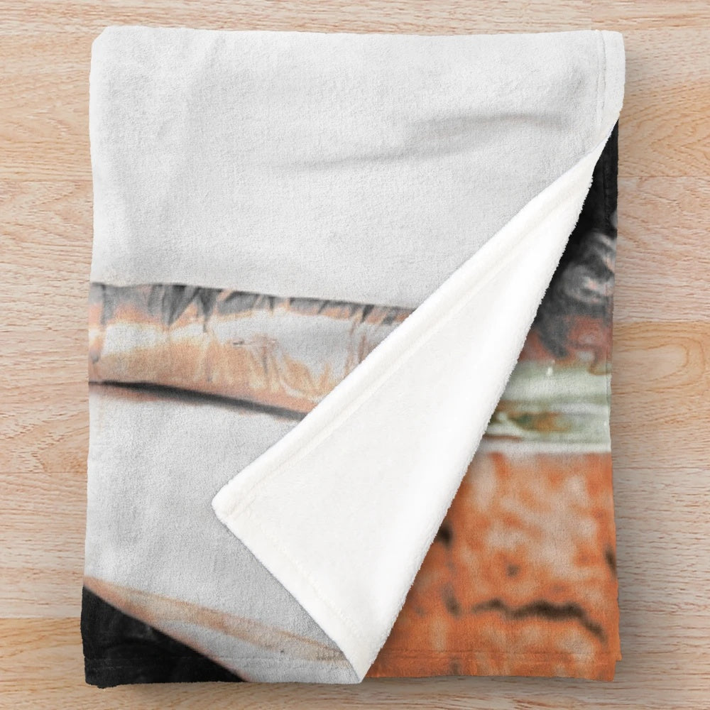 A soft and snuggly plush blanket featuring a mama art design, perfect for movie nights and overcoming fears.