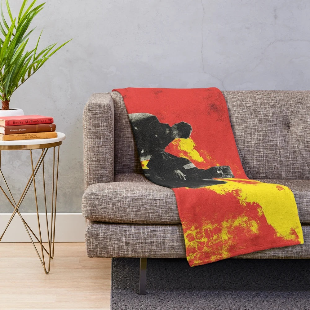 Clancy plush blanket in a cozy living room setting
