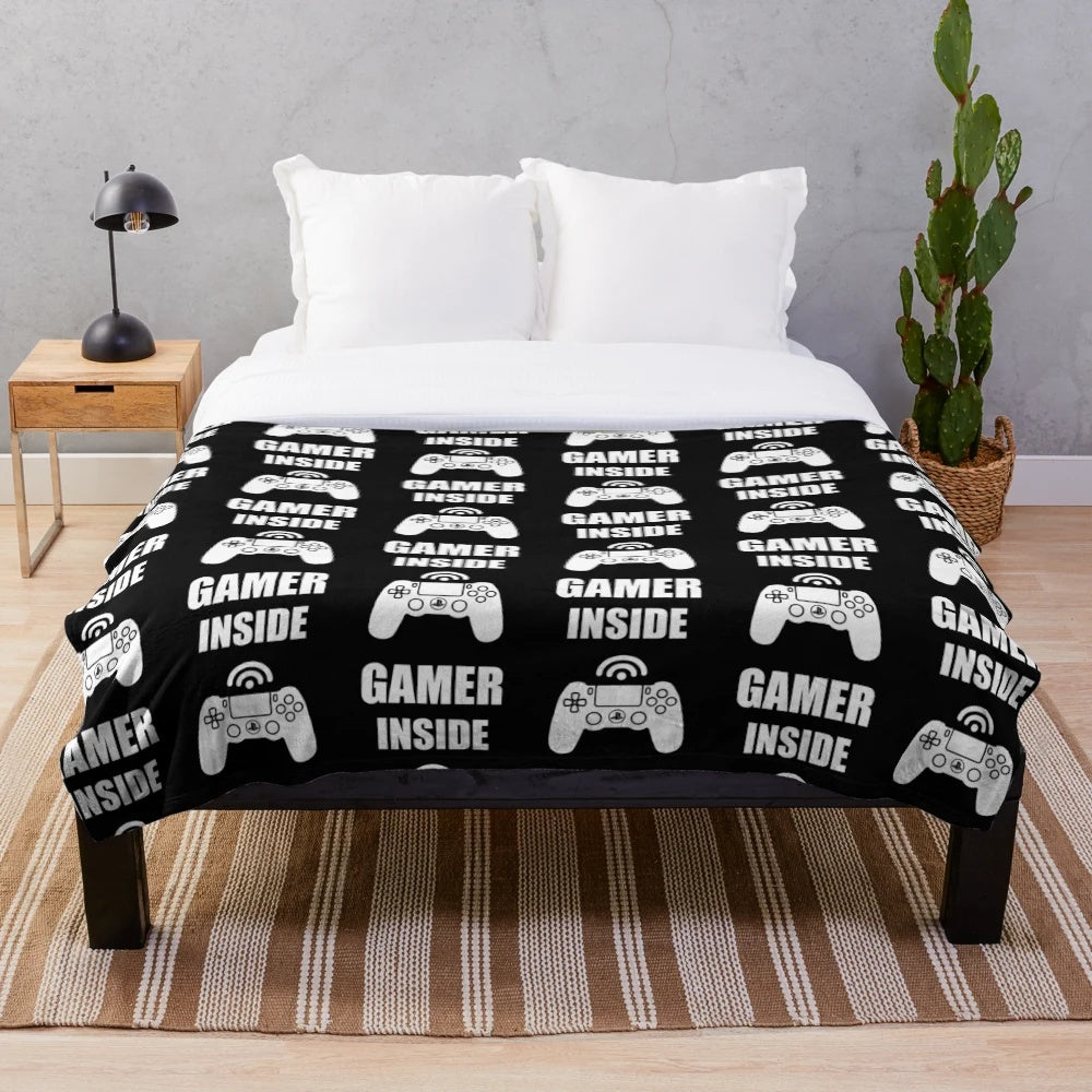 Cozy gaming blanket featuring a gamer design