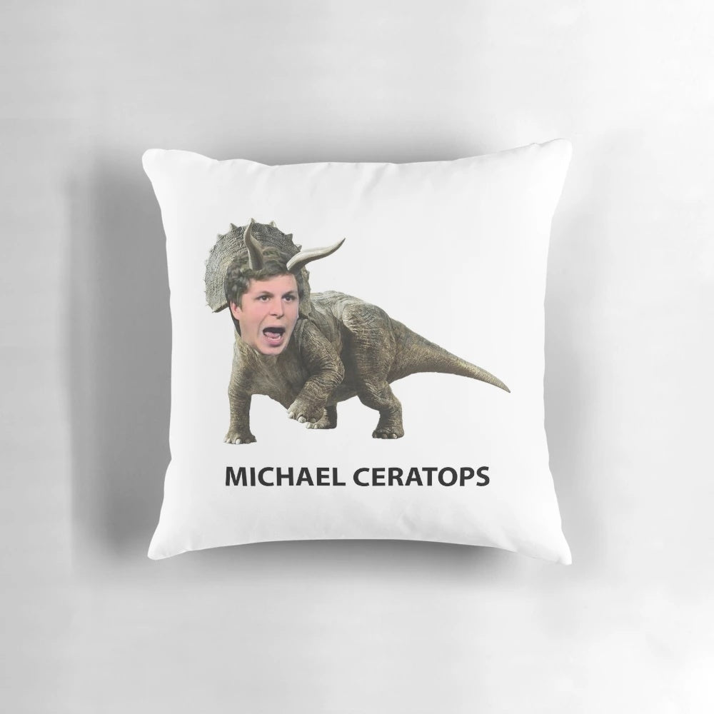 Soft plush pillow featuring the image of a triceratops dinosaur with the face of actor Michael Cera