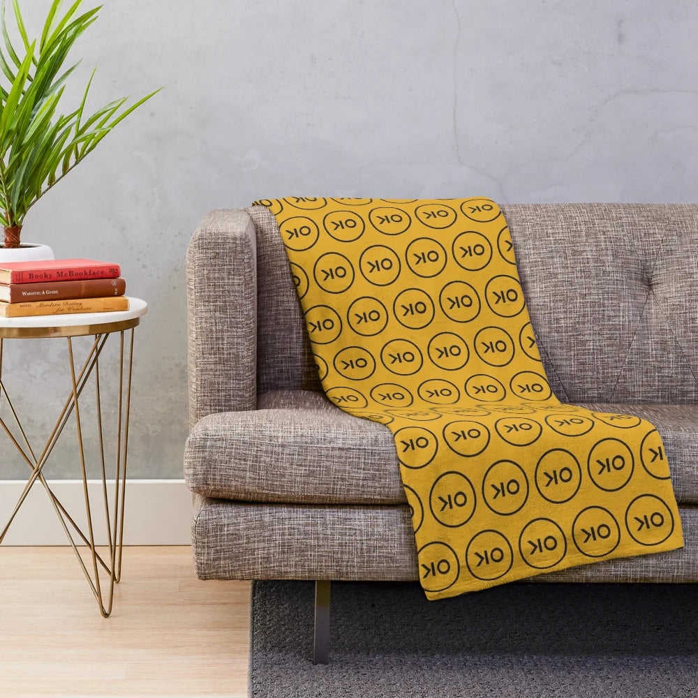 Cozy yellow plush blanket with music-inspired design