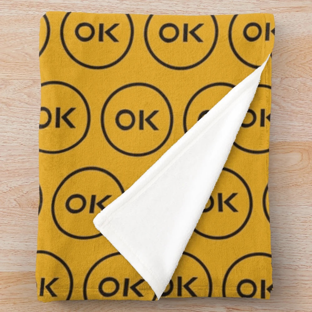 Cozy yellow plush blanket with music-inspired design