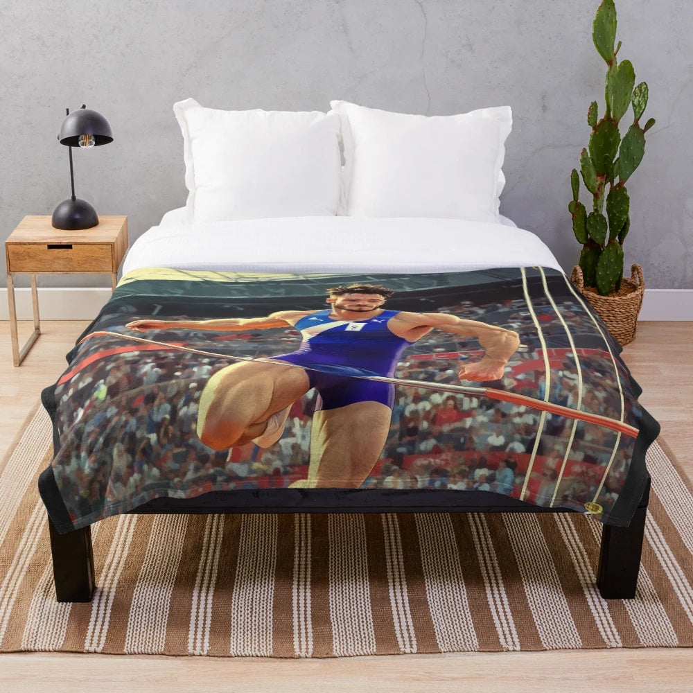 Plush blanket featuring a humorous pole vault mishap illustration