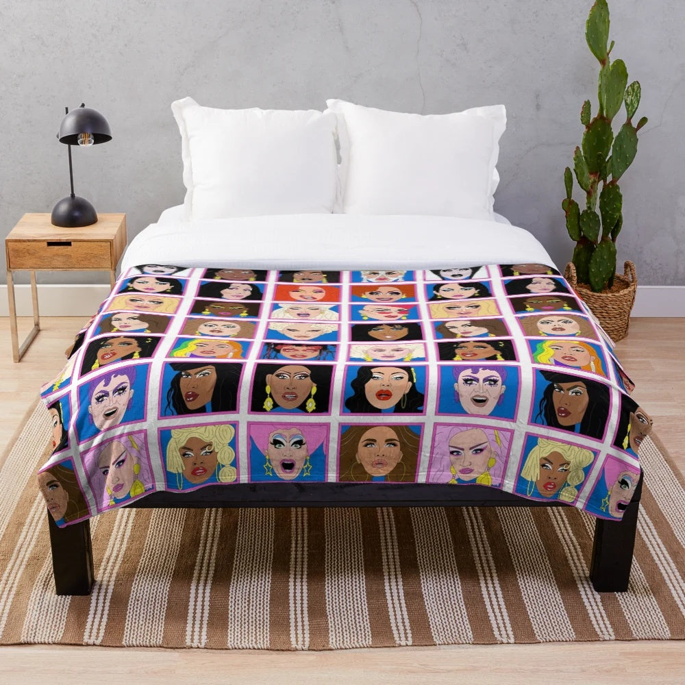 Colorful plush blanket featuring the winners of RuPaul's Drag Race
