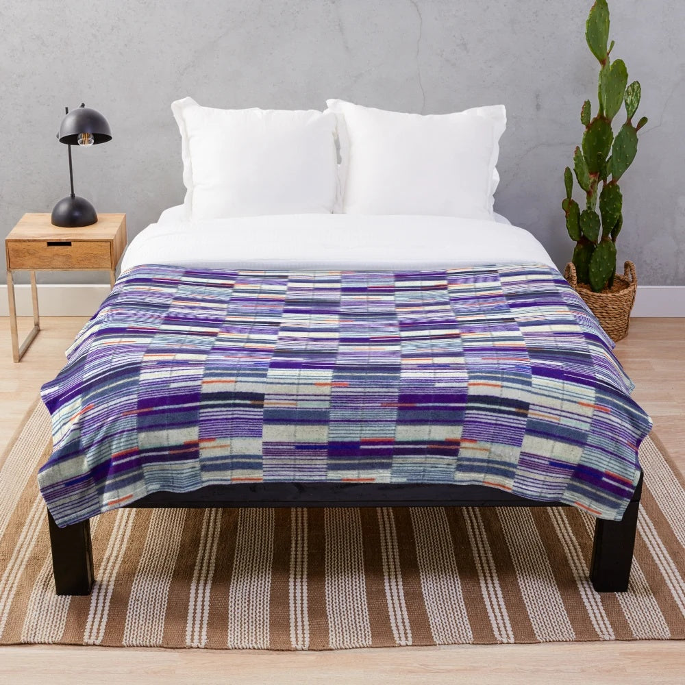 Plush blanket featuring the iconic Elizabeth Line underground moquette pattern