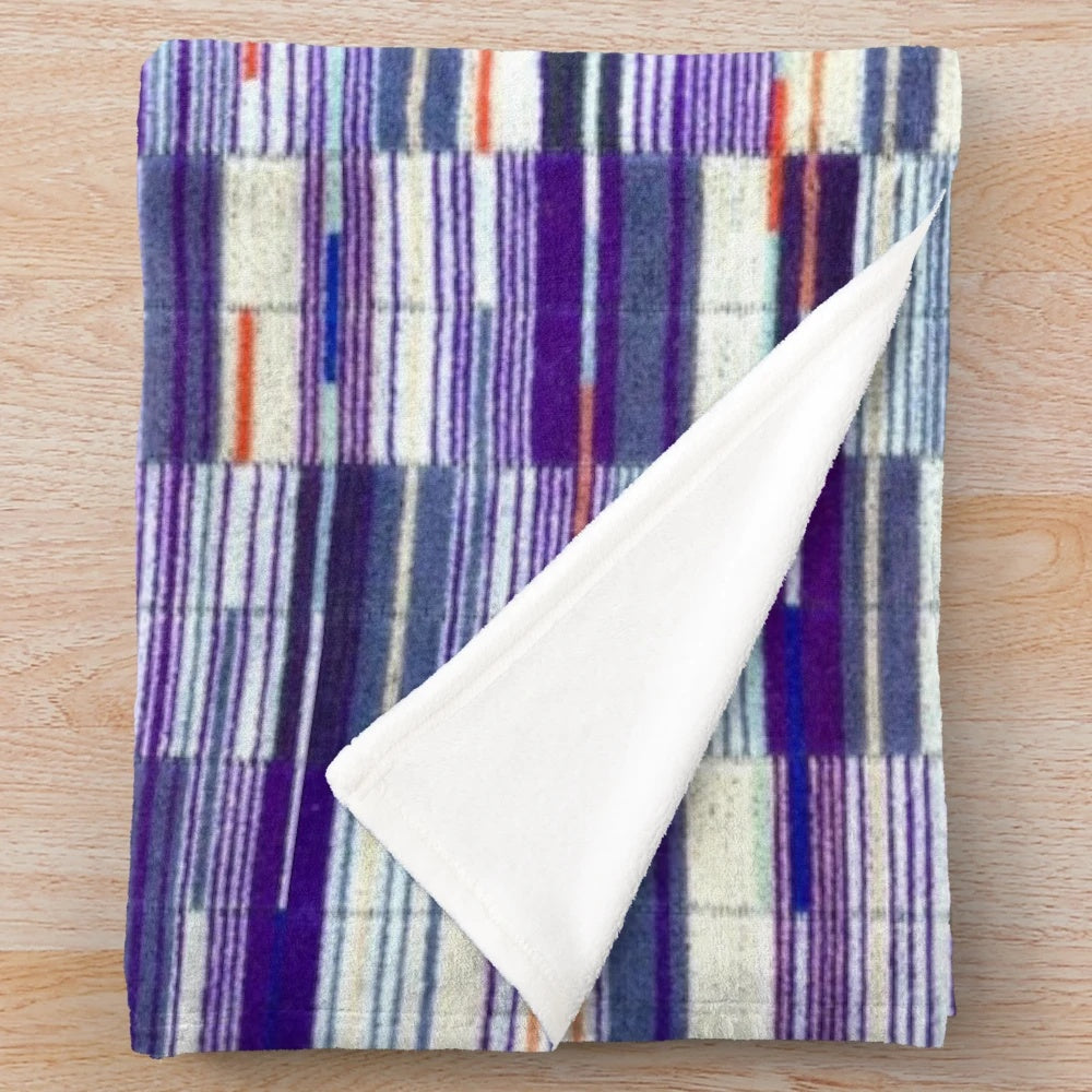 Plush blanket featuring the iconic Elizabeth Line underground moquette pattern