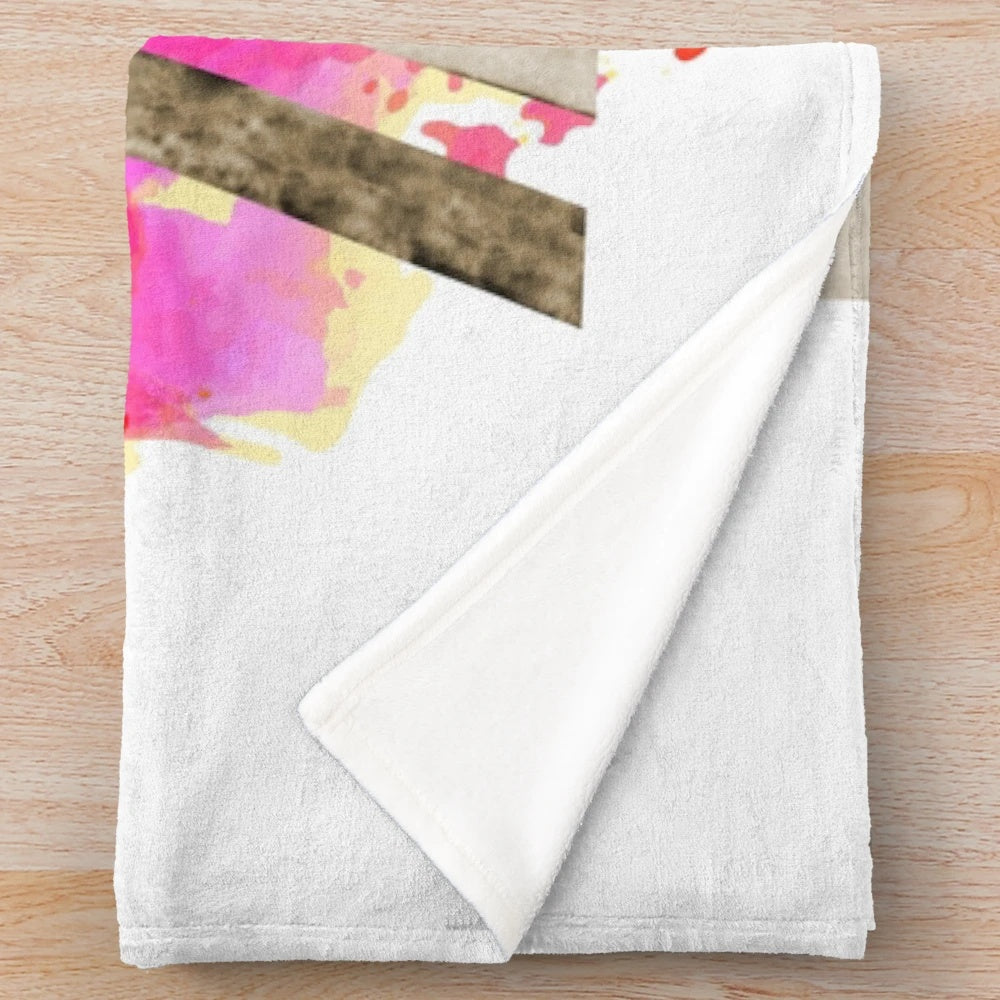 Plush blanket featuring feminist symbols and imagery from the Spanish Civil War
