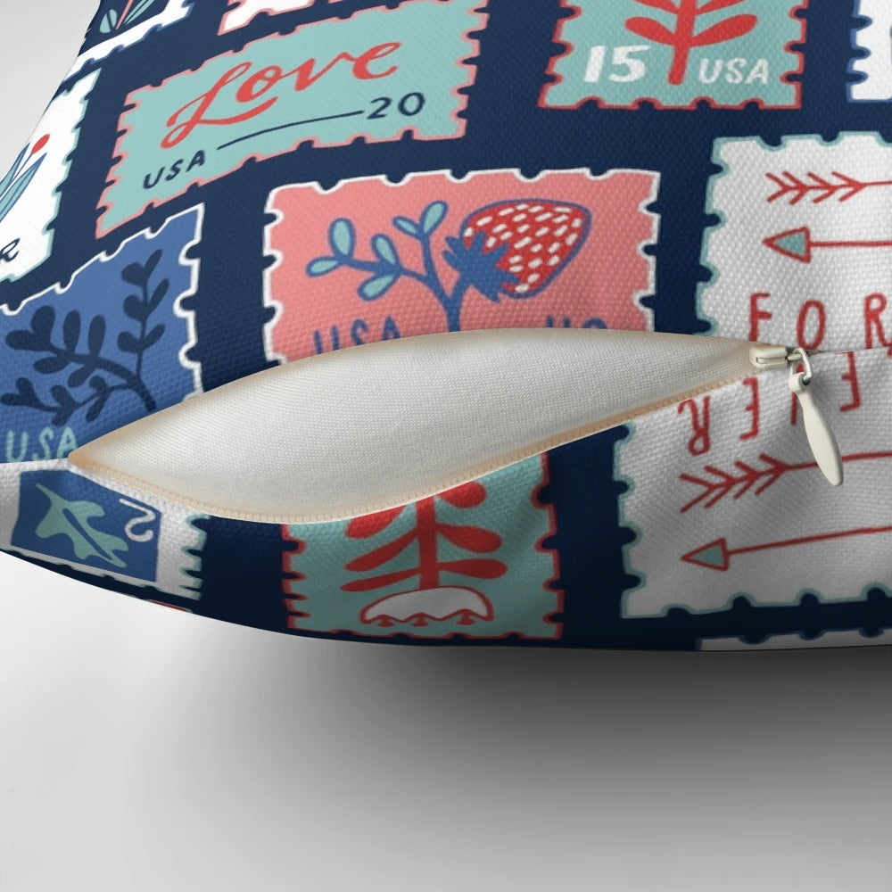 A plush, decorative pillow featuring the iconic USPS Forever Stamps design.