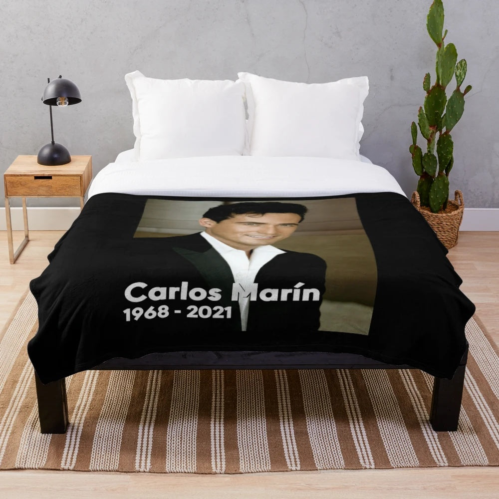 Plush blanket featuring tribute to late Il Divo singer Carlos Marin
