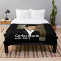 Plush blanket featuring tribute to late Il Divo singer Carlos Marin