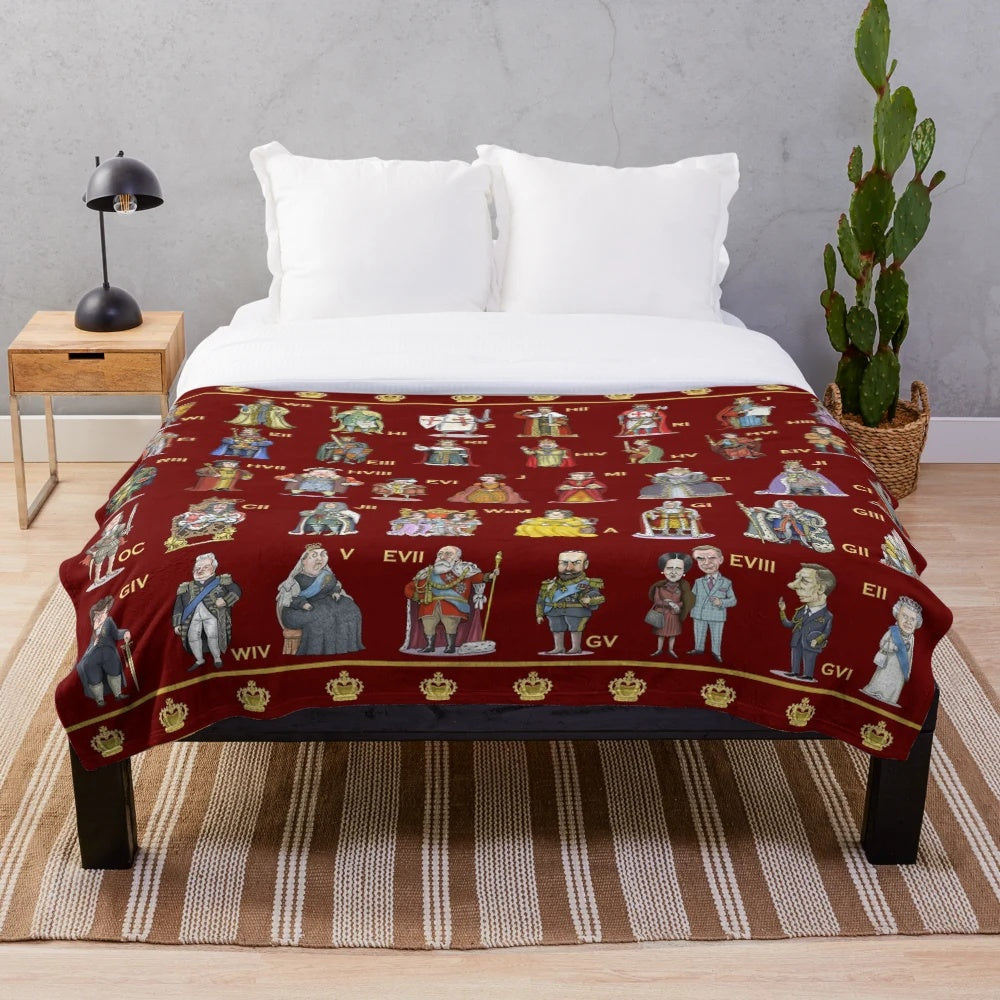 Plush blanket featuring illustrations of British monarchs throughout history
