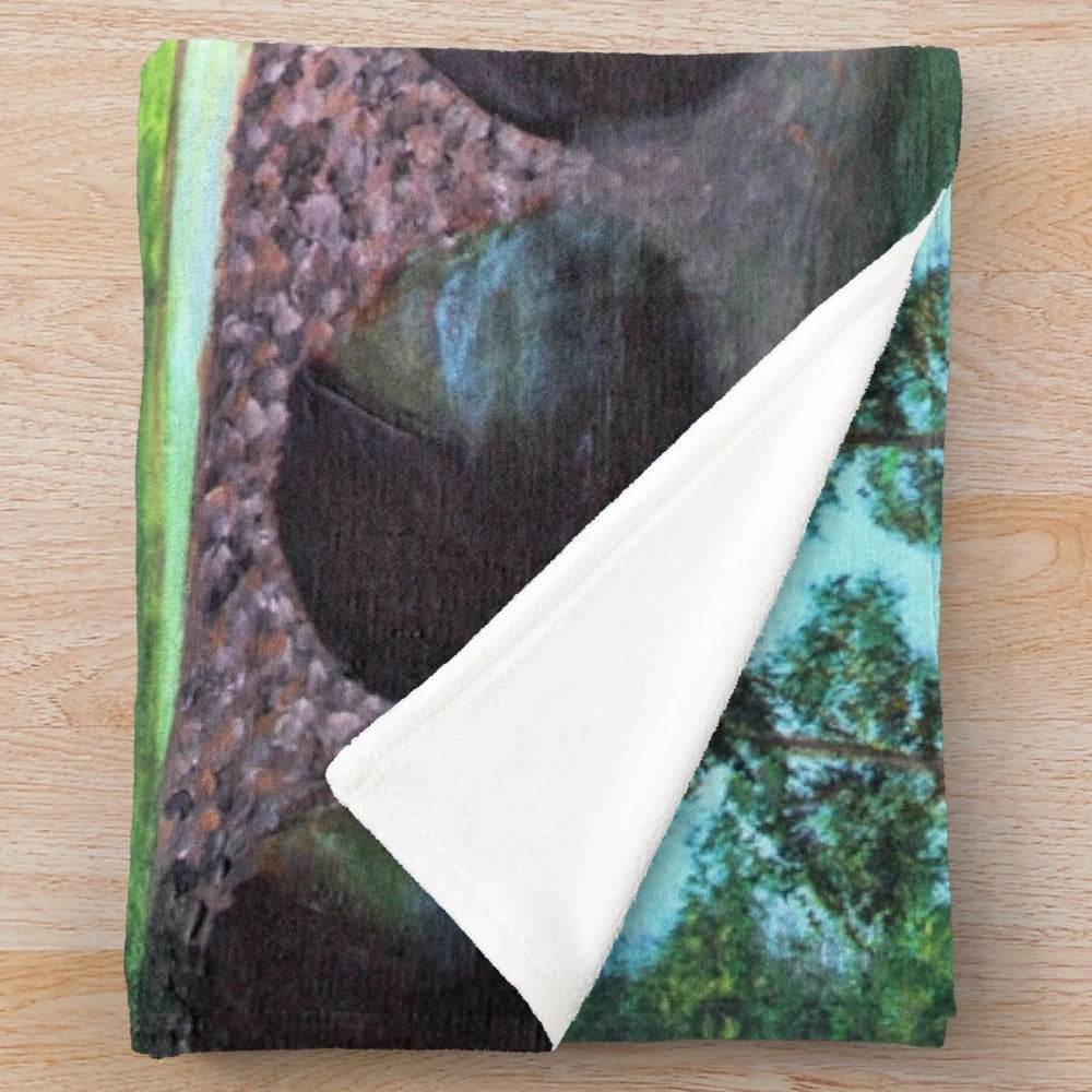Plush blanket depicting the iconic 12th hole at Augusta National Golf Club