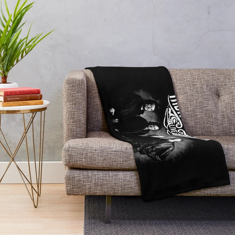 Plush blanket featuring The Highwaymen's American Outlaws band logo