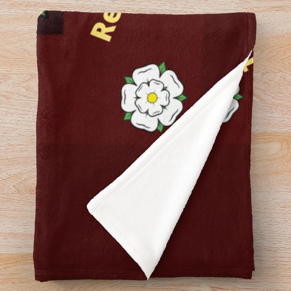 Plush blanket featuring the crest and colors of the Prince of Wales's Own Regiment of Yorkshire