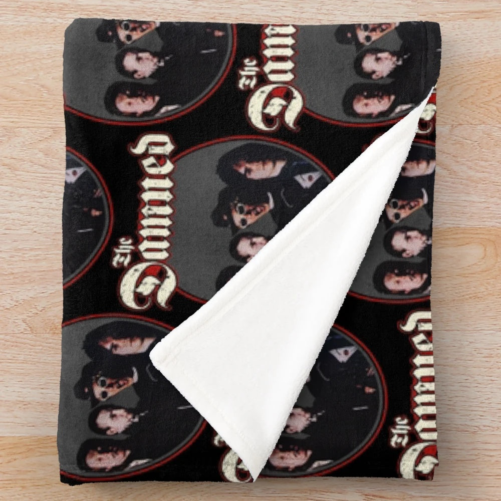 Plush blanket featuring the iconic logo and design of the British punk band The Damned