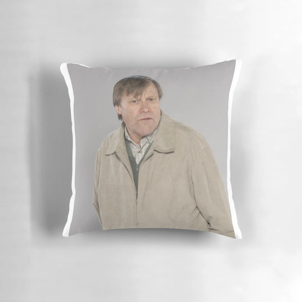 Decorative pillow featuring the iconic character Roy Cropper from the beloved British TV series Coronation Street