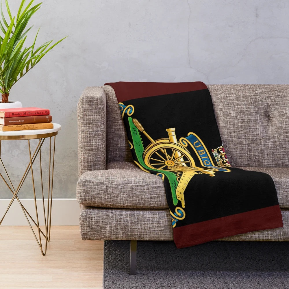 Royal Artillery cap badge design on a soft, plush blanket