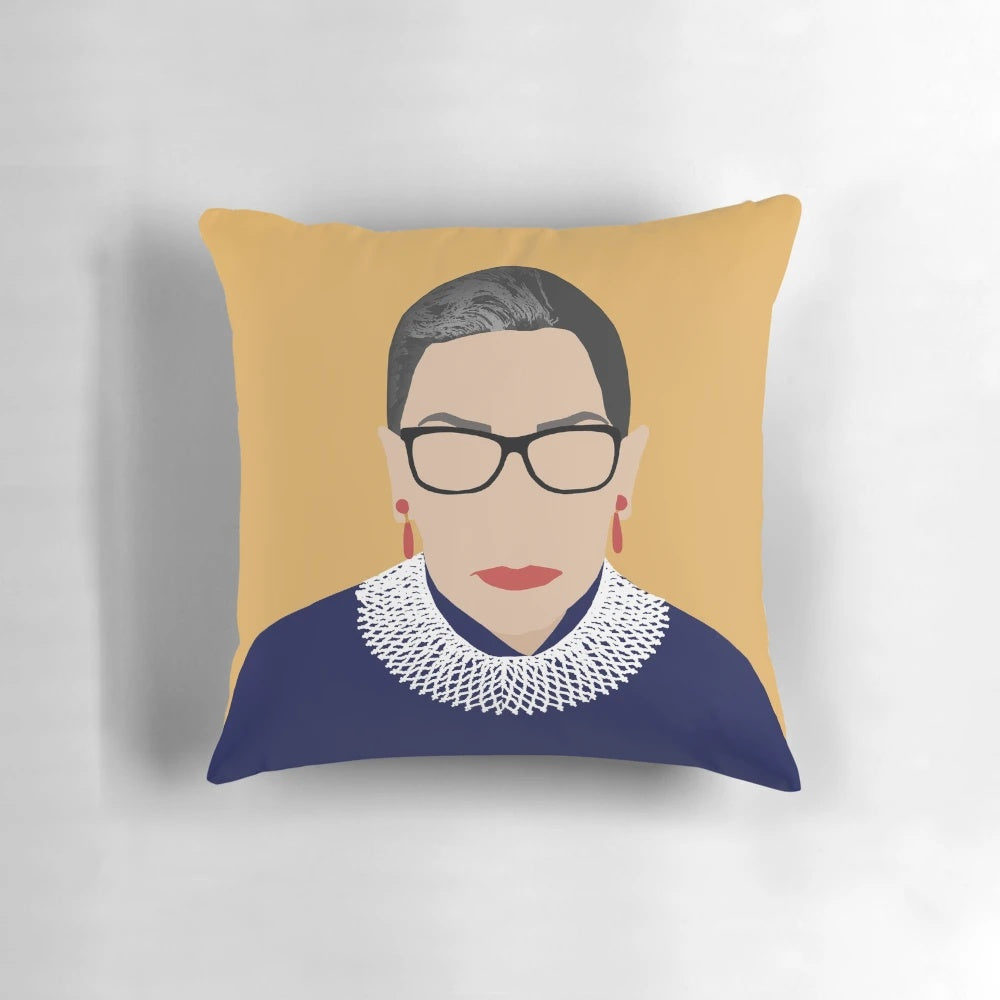 Vibrant yellow pillow with "RBG" text, honoring the legacy of Supreme Court Justice Ruth Bader Ginsburg