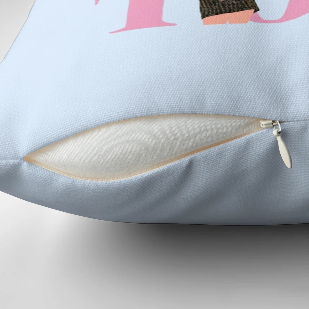 A decorative pillow featuring an artistic representation of the Taylor Swift Eras Tour logo