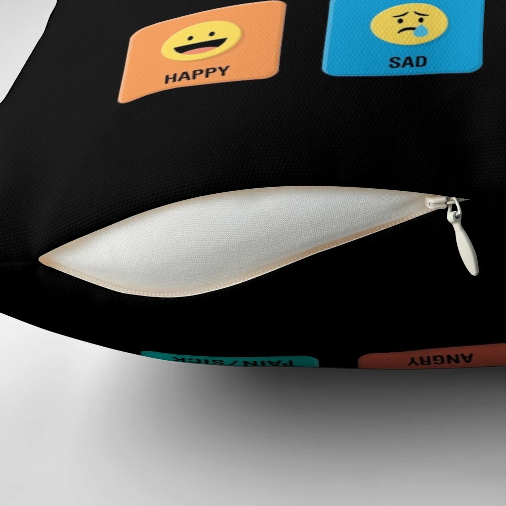 Pillow with pointing symbols and icons to help non-verbal children with autism and other special needs communicate better.