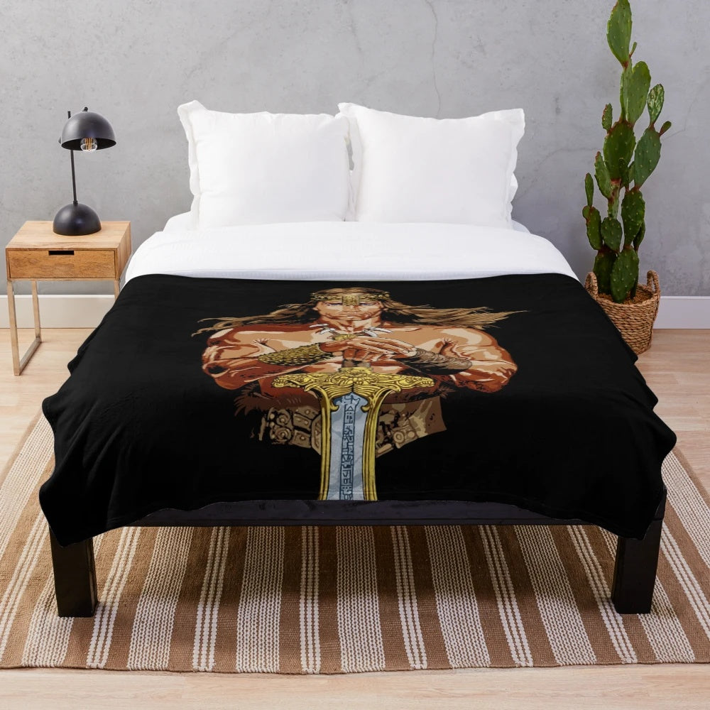 Conan the Barbarian-inspired plush blanket with sword and muscles
