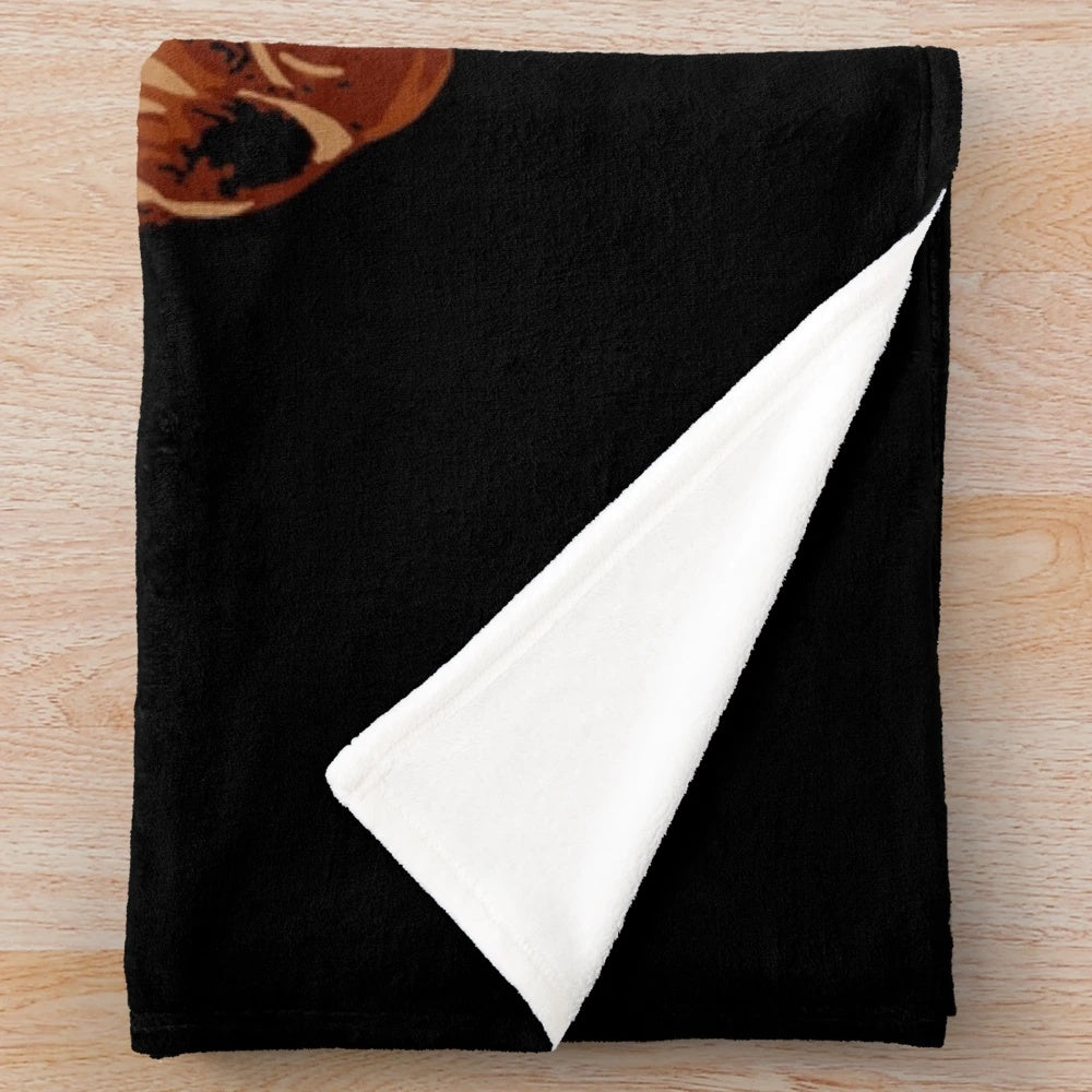 Conan the Barbarian-inspired plush blanket with sword and muscles