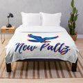 SUNY New Paltz plush blanket with conceptual colors design
