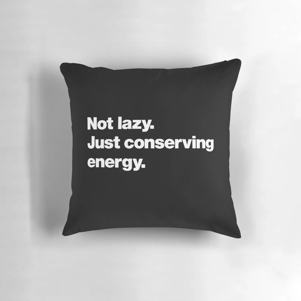 Not Lazy, Just Conserving Energy" pillow, featuring a humorous and witty design
