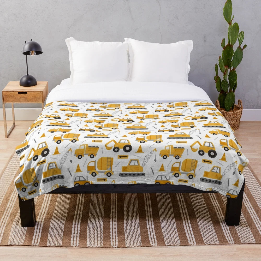 Construction trucks plush blanket with excavators, dump trucks, and cranes