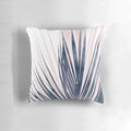 Contemporary palm leaf design pillow in navy blue and blush pink colors