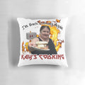 Cooking-themed throw pillow featuring "I'm Back Cooking Again" text