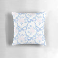 A pink and white pillow with a coquette balletcore pattern, featuring bows and ribbons for a soft, feminine touch.