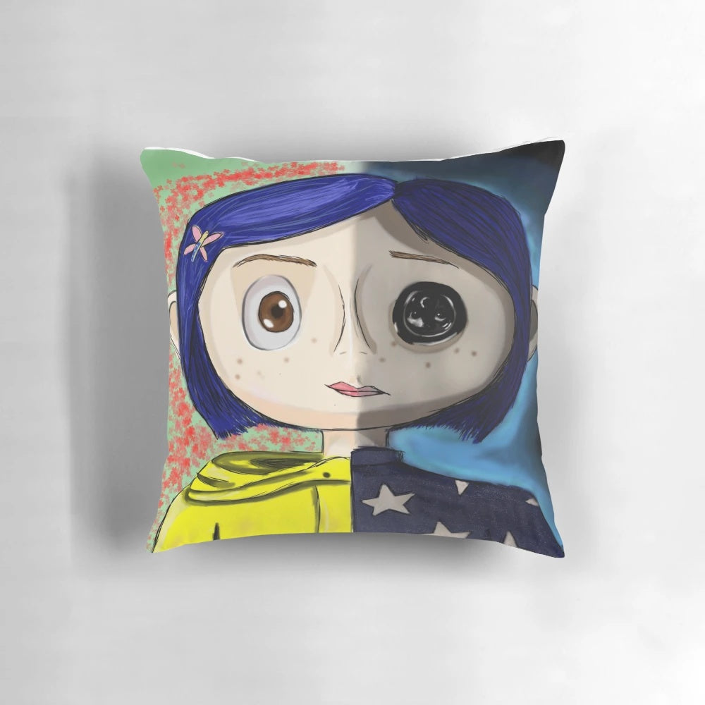 Coraline-inspired decorative pillow with blue and yellow colors, floral patterns, and paranormal elements
