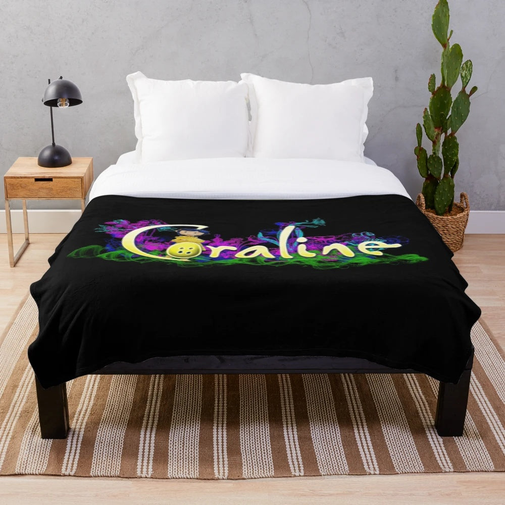 Coraline-themed plush blanket featuring dark fantasy and spooky elements
