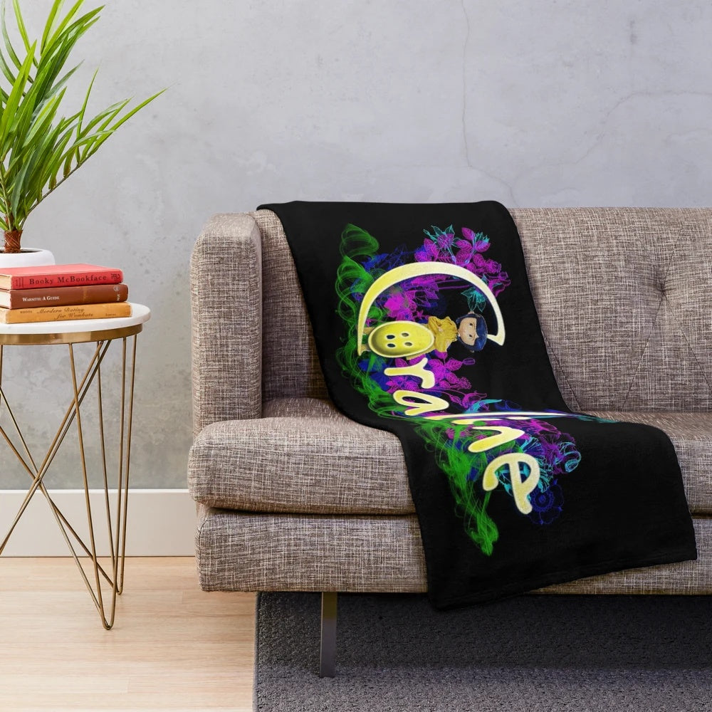 Coraline-themed plush blanket featuring dark fantasy and spooky elements
