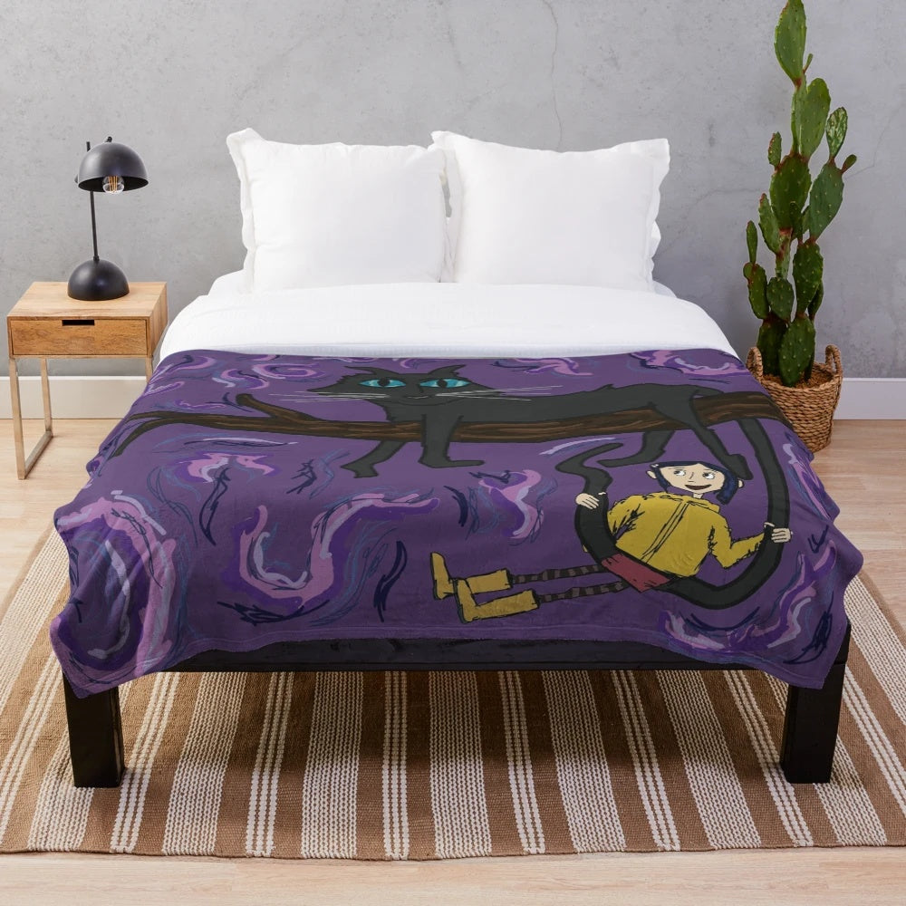 Coraline-inspired plush blanket with whimsical swirls and black cat design