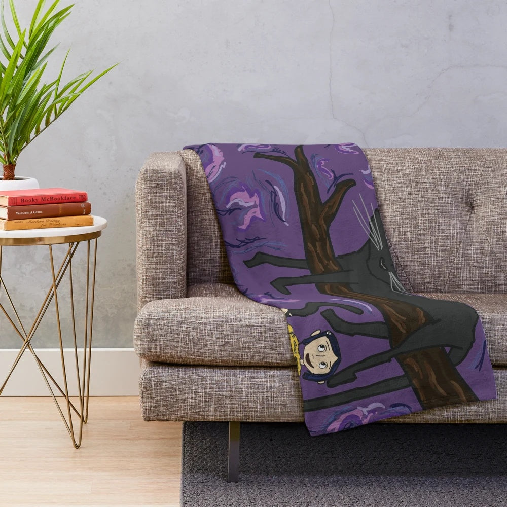 Coraline-inspired plush blanket with whimsical swirls and black cat design