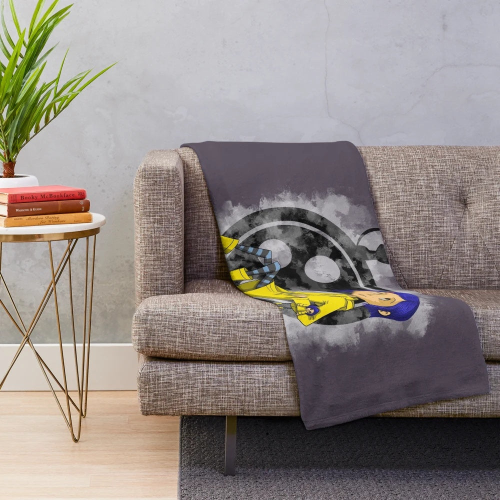 Coraline-inspired twitchy witchy girl plush blanket featuring a cat and doll design