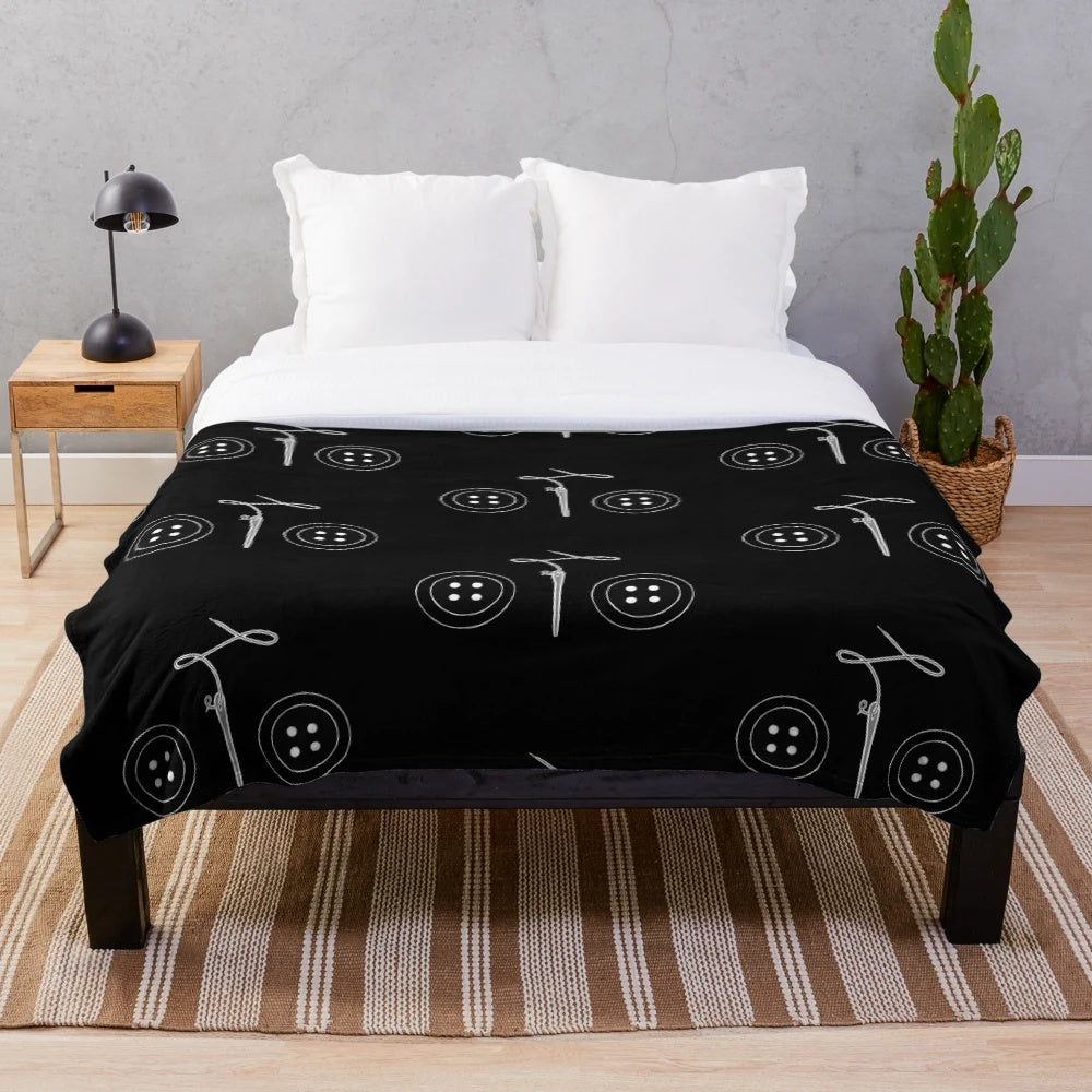 Coraline Jones inspired plush blanket with a creepy cute, spooky aesthetic
