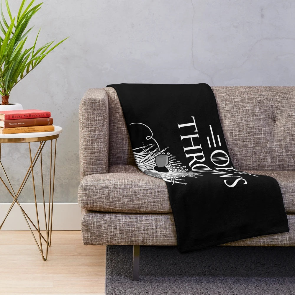 Cornhole inspired plush blanket with Game of Throws design