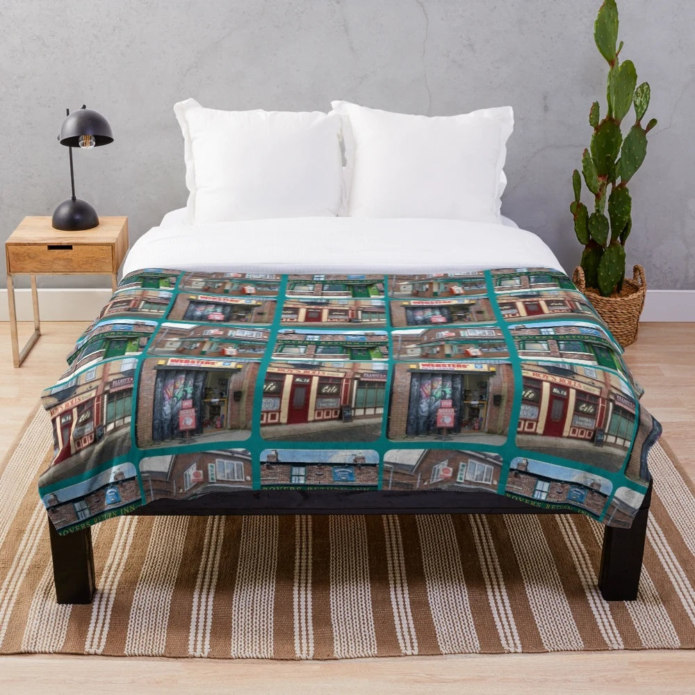 Corrie iconic buildings plush blanket featuring Coronation Street landmarks