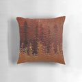 Copper bronze pillow with a corroded, degraded surface texture