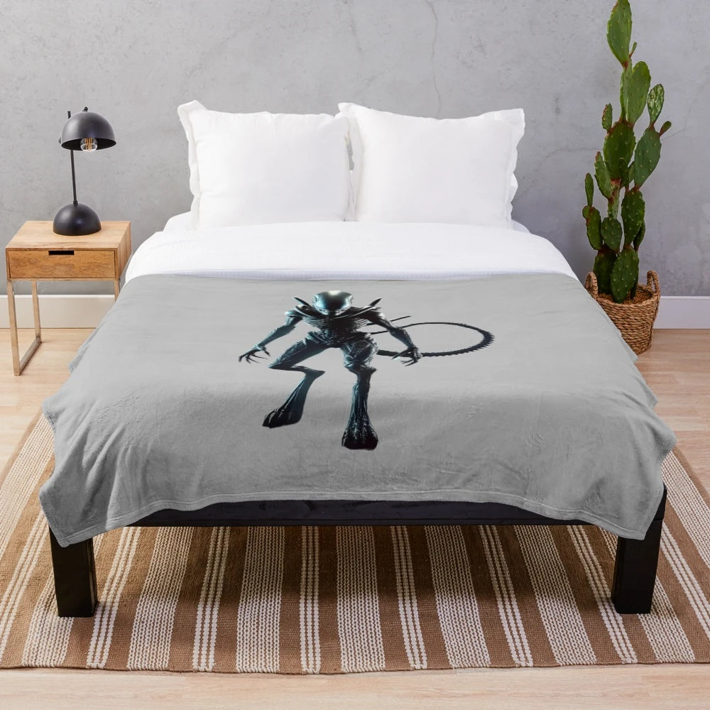 Alien-inspired plush blanket with space-themed design
