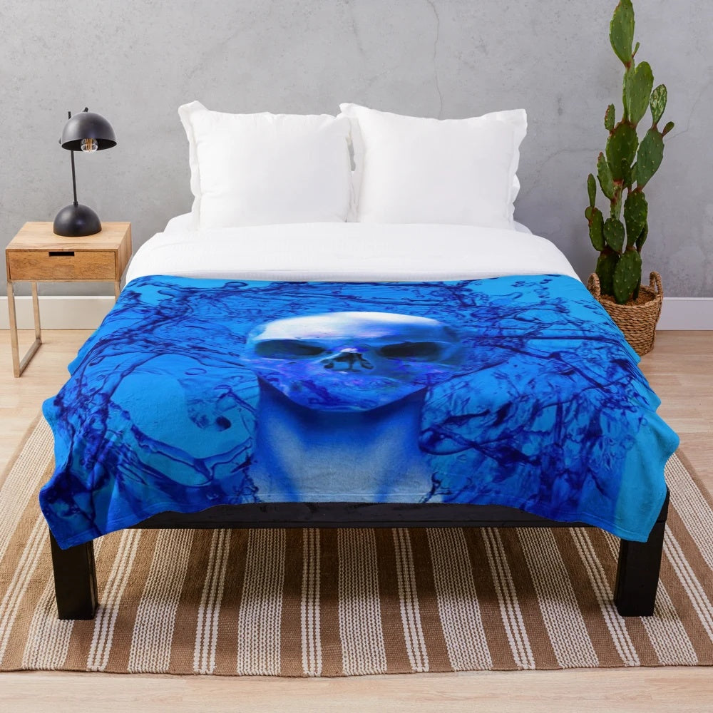 Alien skull plush blanket in vibrant blue and purple hues