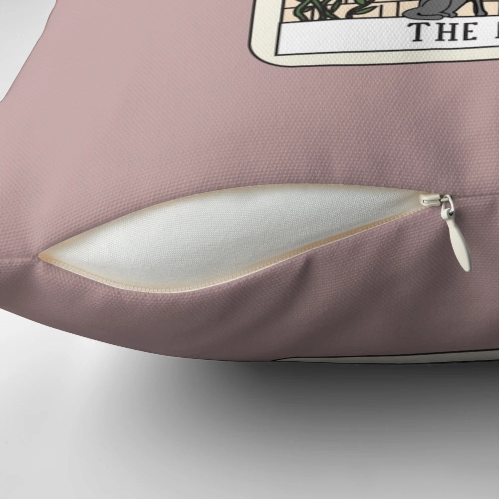 A plush pizza-shaped pillow with mystical moon and star designs, perfect for reading tarot cards and relaxing.