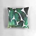Cosmic Banana Leaves Pillow with a tropical space galaxy design