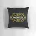 A decorative pillow with a science fiction-inspired "pew pew pew" design.