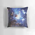 Blue galaxy print pillow with a cosmic, nebula-inspired design